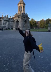 Emilee at Trinity College Dublin in front of the Campanile