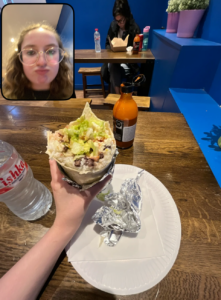 A bereal of me with my burrito from Mama's Revenge